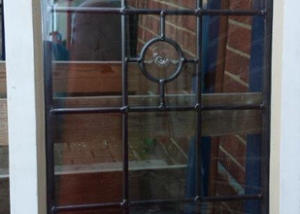 Triple glazed unit with traditional lead light